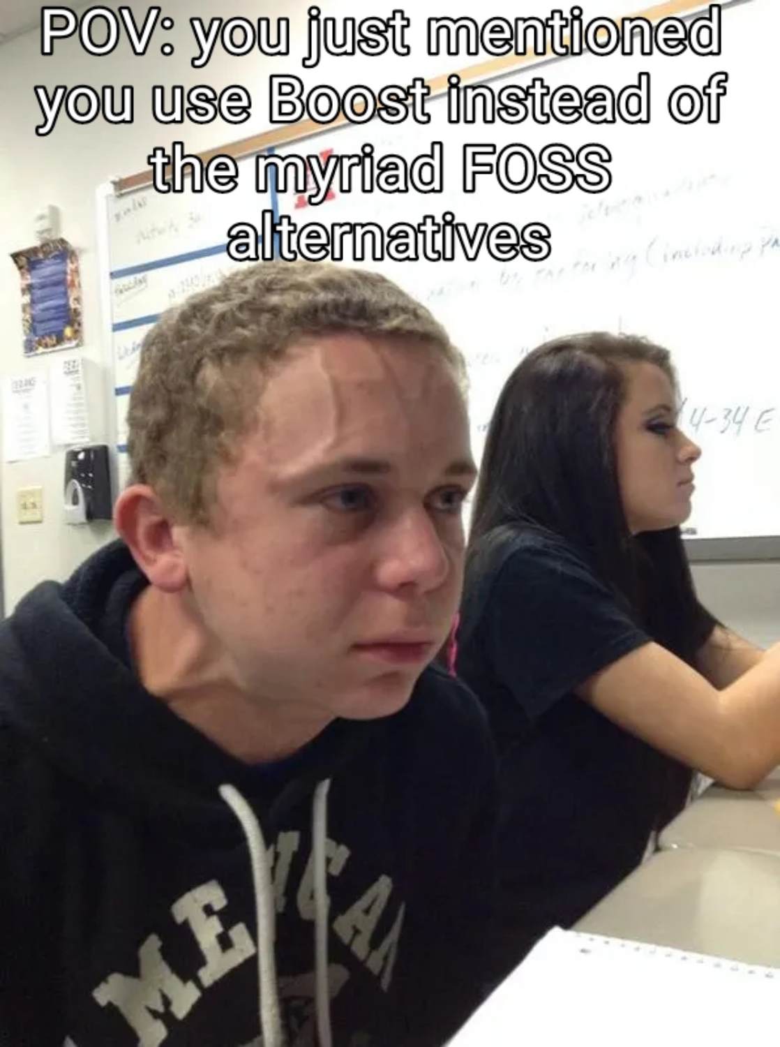 Guy trying to hold a fart in meme template with the text "POV: you just mentioned you use Boost instead of the myriad FOSS alternatives"